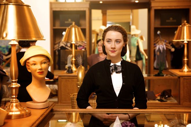 This photo provided by Fox Searchlight shows, Saoirse Ronan as Eilis in a scene from the film, "Brooklyn."  The movie opens in U.S. theaters on Nov. 4, 2015. (Kerry Brown/Fox Searchlight via AP) ORG XMIT: CAET680